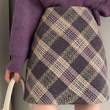 Højtaljet uldternet A-formet nederdel