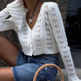 Langærmet vest i åbent strik med V-hals