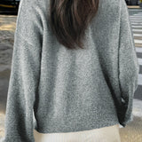 Minimalistisk cardigan med lange ærmer og knapper