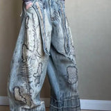 jeans med vide ben og nålebroderi