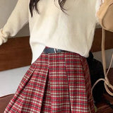 Ternet plisseret nederdel i uld