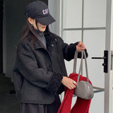 Vendbar pelsfrakke med bløde reverser