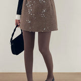 Nederdel pyntet med krystalperler