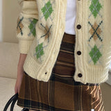 Højtaljet nederdel med farveblok og ternet mønster