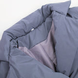 Tætsiddende vinterfrakke med revers og bælte