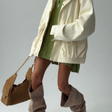 Jakke med elastisk talje og praktiske lommer