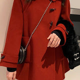 Frakke i uldblanding med frogging