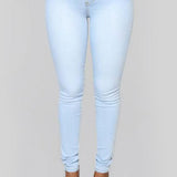Højtaljede hvide skinny jeans