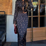 Todelt sæt: blomstret crop top med bindebånd i taljen og tætsiddende nederdel med slids