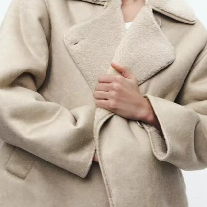 Dobbeltsidet shearlingjakke