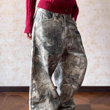 Vide jeans i hiphop-stil med camouflagevask.