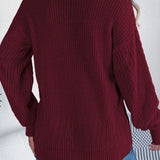 Løstsiddende, langærmet, enkeltradet strikcardigan