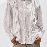 Løstsiddende bluse med blomsterprint og flæser