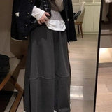 Højtaljet, lang nederdel med flæser i uldblanding