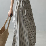 Lang, stribet, højtaljet A-formet nederdel med bindelukning