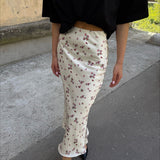 Højtaljet blyantnederdel med blomsterprint