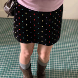 Trendy fløjlsnederdel med broderede polkaprikker