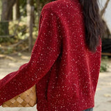 Uldcardigan broderet med et vintage-smil