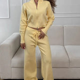 Todelt, tætsiddende striksæt med tovejslynlås for komfort på farten