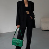 Afslappet sort blazer i retrostil