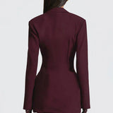 Kort, tætsiddende kjole med dyb V-udskæring og markeret talje, ensfarvet