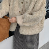 Vendbar pelsfrakke med bløde reverser