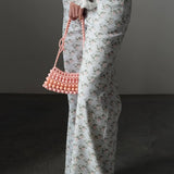 Lyseblå jeans med blomsterprint, højtaljede og vide ben