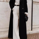 Lang frakke i ensfarvet uldblanding