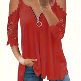 Lotte - Bluse med lynlåslukning og usædvanlige skuldre