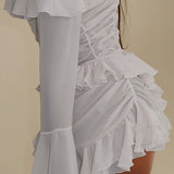 Elegant sæt med langærmet, flæset nederdel uden skuldre