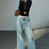 falmede, vide, slidte jeans