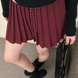 Plisseret mini-nederdel i strik