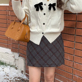 Ribbet cardigan med glitrende sløjfe