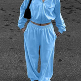 Dame joggingsæt - Kort lynlåsjakke med hætte - Højtaljede bukser