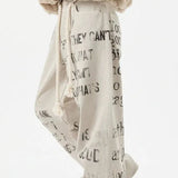 Abrikosfarvede denimjeans med lige ben og graffitiprint