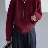 Oversized cardigan med hjerteformede knapper og rund hals