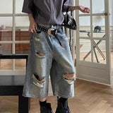 Vide, revnede og løstsiddende Capri-jeans