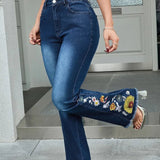 Skinny jeans med svaj og broderi af blomster