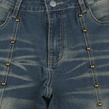 Lavtaljede jeans med svaj og nitter