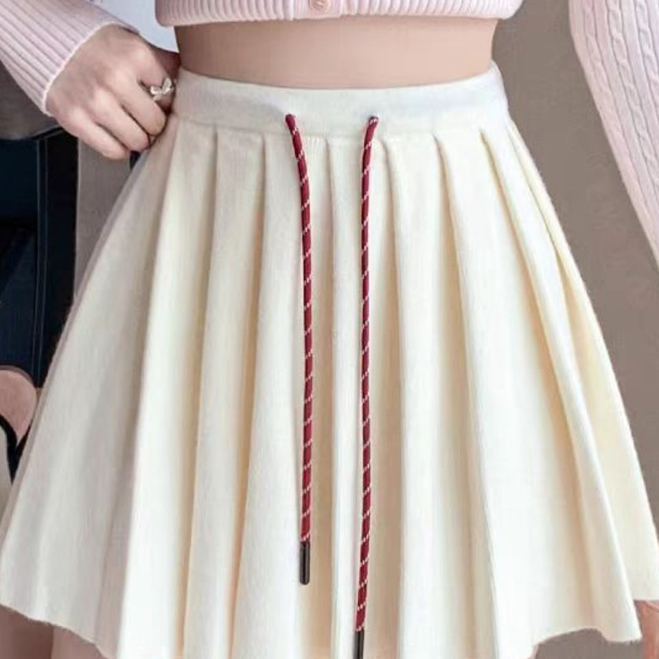 Plisseret mini-nederdel i strik