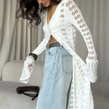 Langærmet strandvest med svaj i strik