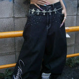 Lige jeans broderet med englevinger og rhinsten