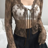 Kort, transparent cardigan med snørebånd og sløjfe foran