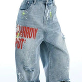 Brede jeans med falmet broderi