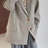 Oversized spættet blazer med knæ