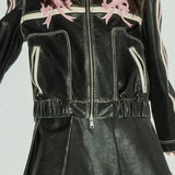 Bikerjakke i imiteret læder med dekorativ sløjfe