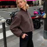 Retro grå ruskindspilotjakke med opretstående krave og lynlåslukning