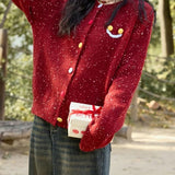 Uldcardigan broderet med et vintage-smil