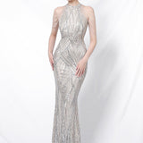 Paillettebesat havfrue-maxikjole med åben ryg