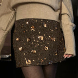 Højtaljet trapeznederdel broderet med pailletter